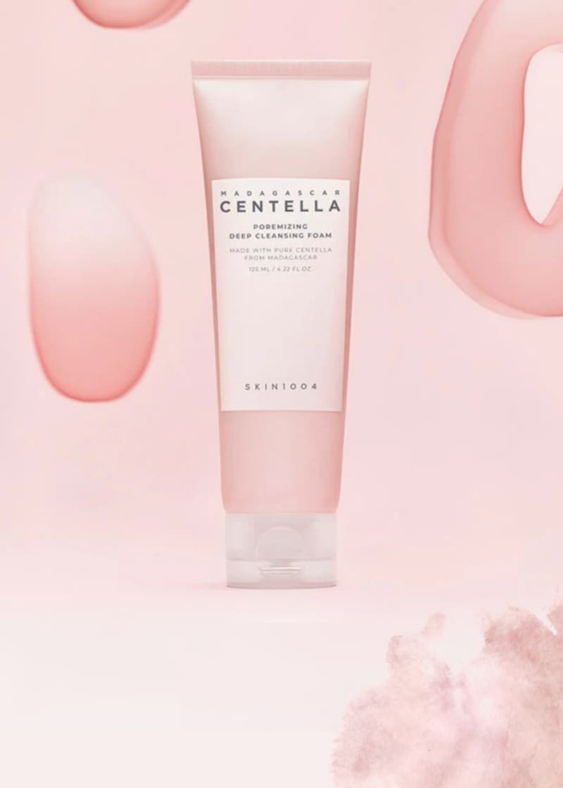 Skincare tube labeled 'Centella' on a pink background