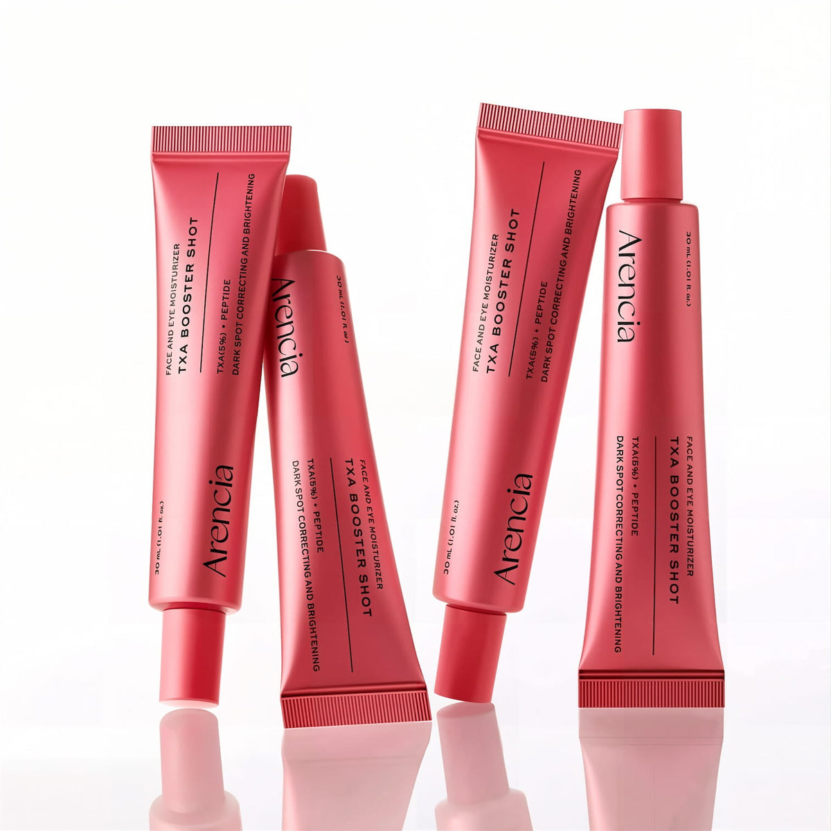 Four light red ARENCIA TXA Booster Shot cosmetic tubes arranged upright on a white reflective surface, with the brand name Arencia clearly visible on each tube.
