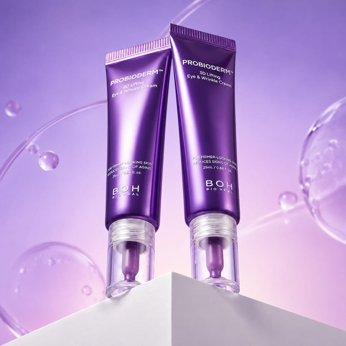 Two tubes of BIOHEAL BOH Probioderm 3D Lifting Eye & Wrinkle Cream 25ml with purple translucent skincare bubbles on a luxury light purple gradient background