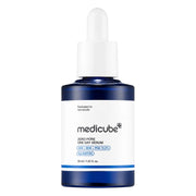 Medicube Zero Pore One Day Serum in a 30ml dark blue bottle with a white dropper cap and white label, on a plain white background.