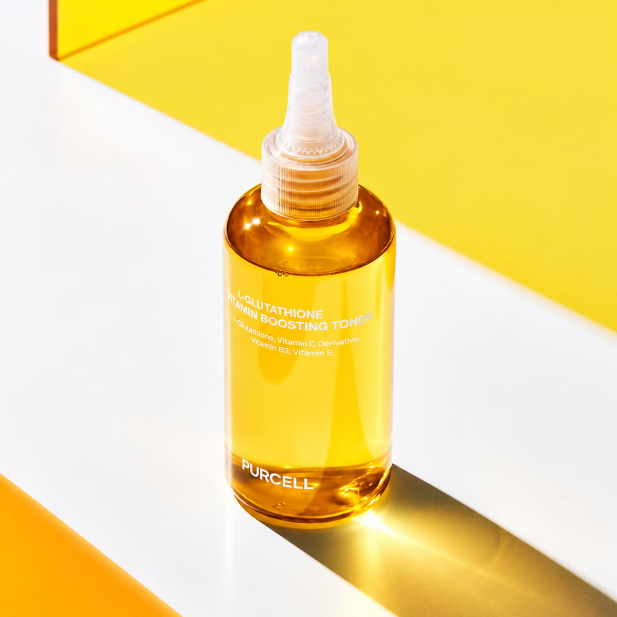 A bottle of PURCELL L-Glutathione Vitamin Boosting Toner filled with golden-yellow liquid, featuring a white dropper cap, set against a modern background of white and bright yellow geometric panels.