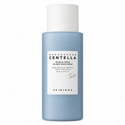 SKIN1004 Madagascar Centella Hyalu-Teca Glass Skin Milk 210ml in a light blue bottle with a white cap and white label, shot against a plain white background.
