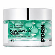 A clear cosmetic jar of VT Cosmetics PDRN Capsule Cream 100 50ml with a silver lid and a transparent front showing mint-green capsules inside, on a white background.