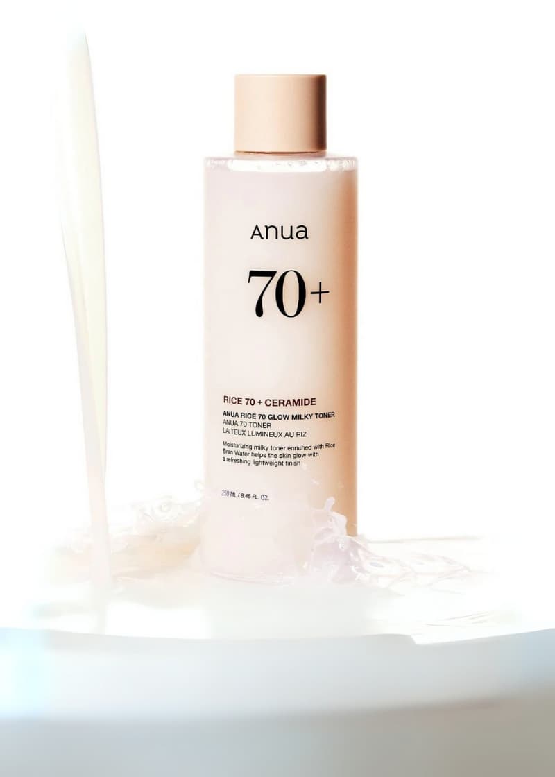 Anua rice milk toner skincare bottle with text on a white background