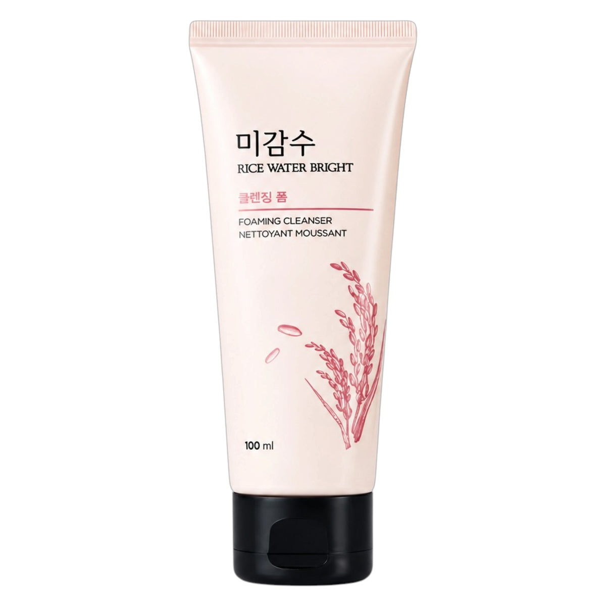 A 100 ml squeeze tube of Rice Water Bright Foaming Cleanser, featuring a pale pink body with a black flip-top cap and a pink rice plant illustration, set against a plain white background.